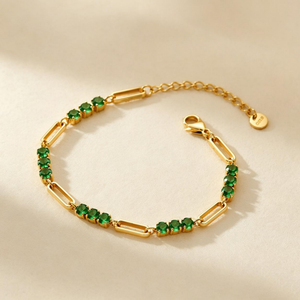 Clara Bracelet, gold paperclip links with emerald-green stones and extender chain